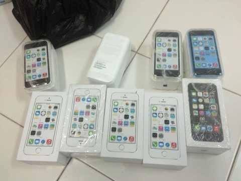Cho gạch, kẹo lạc vào hộp iPhone5 lừa người mua qua mạng